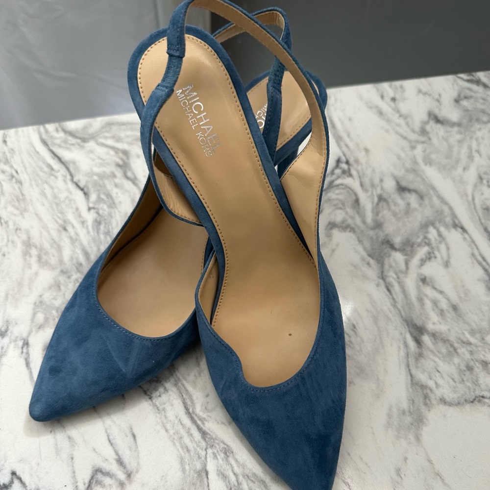 Used Michael kors women’s sling back pumps.